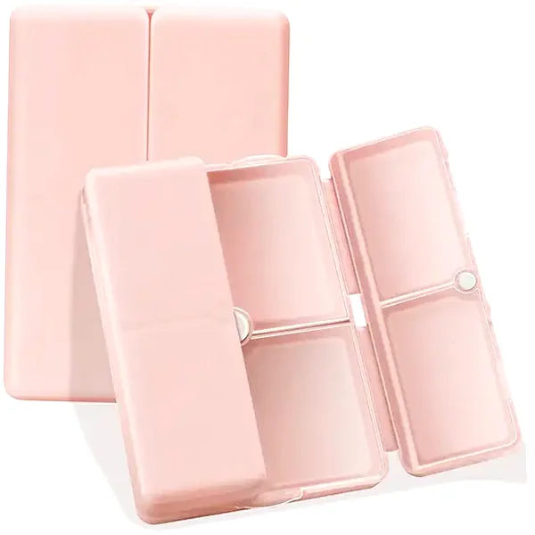Pink folding 7-compartment travel pill organizer for vitamins and meds